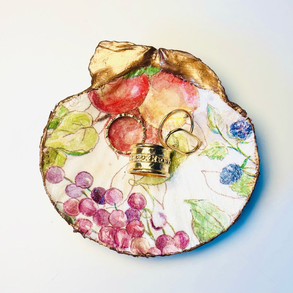 Handmade shell ring dish with fruit decoupage design.